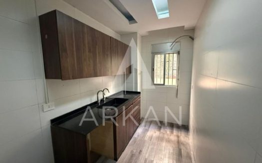 Apartment for Sale in Ballouneh | 70 sqm Ground Floor Apartment with Terrace